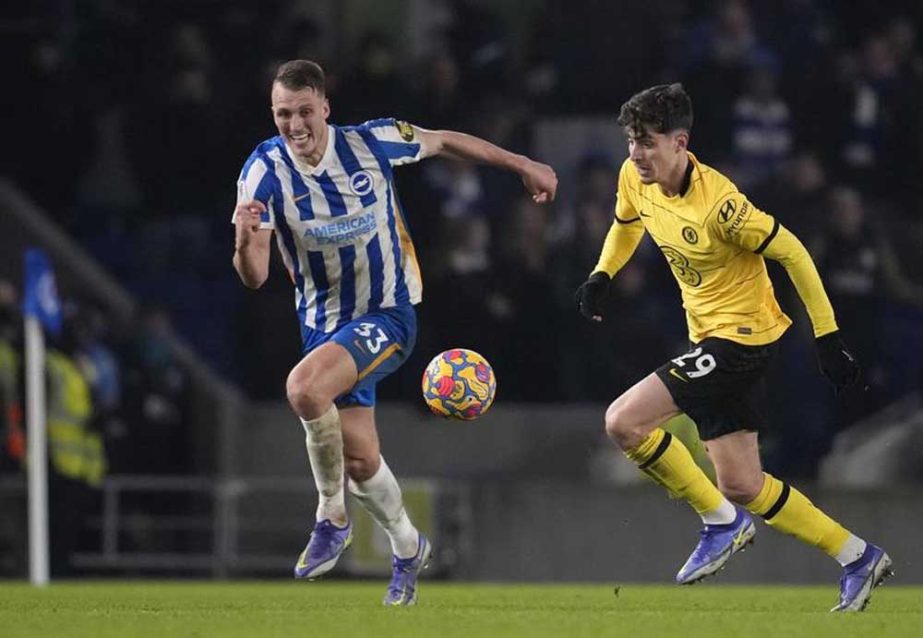 Chelsea's Kai Havertz (right) duels for the ball with Brighton's Dan Burn during their English Premier League soccer match at the Falmer stadium in Brighton, England on Tuesday. AP photo