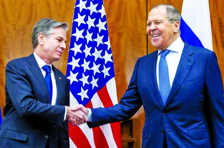 US Secretary of State Antony Blinken, left, and Russian Foreign Minister Sergei Lavrov shake hands before their meeting in Geneva, Switzerland on Friday.