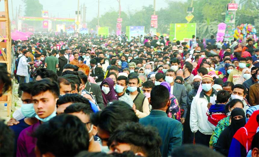 A large crowd of visitors throng the Dhaka International Trade Fair (DITF) at Purbachal in the capital on Friday, defying physical distancing protocol though Covid-19 cases surging in Bangladesh at fastest rate.