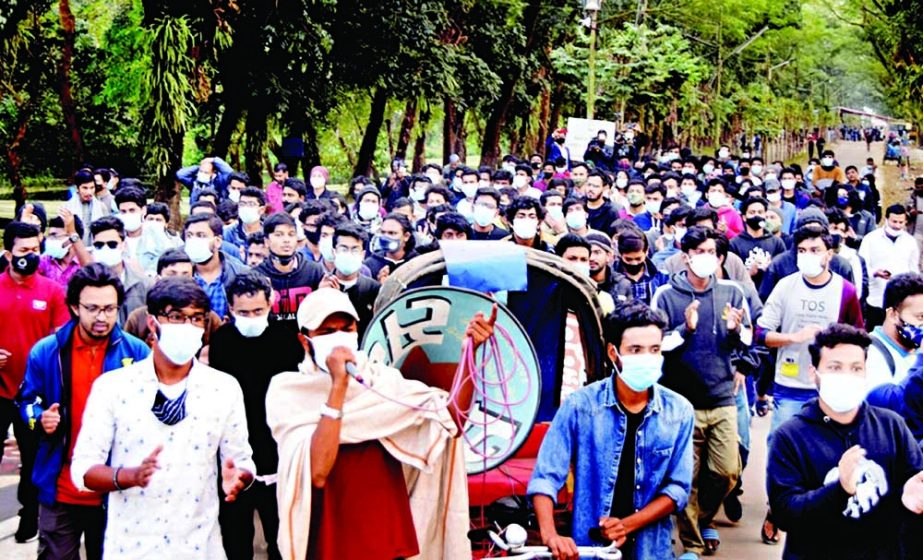 Several hundred students of Shahjalal University of Science and Technology (SUST) bring out a rally on the campus on Tuesday demanding resignation of the university's vice-chancellor Farid Uddin Ahmed. NN photo