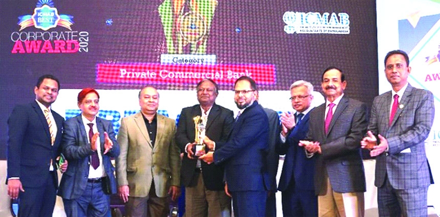 Commerce Minister Tipu Munshi handing over the award to BRAC Bank's Financial Controller Mohammad Abdul Ohab Miah at Hotel Le Meridien recently.