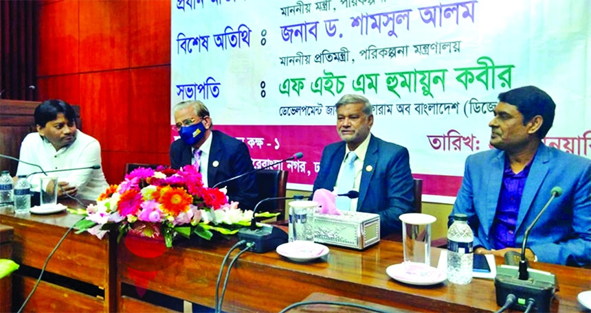 Planning Minister MA Mannan speaks at the general meeting of Development Journalist Forum of Bangladesh at the conference room of the ministry on Friday.