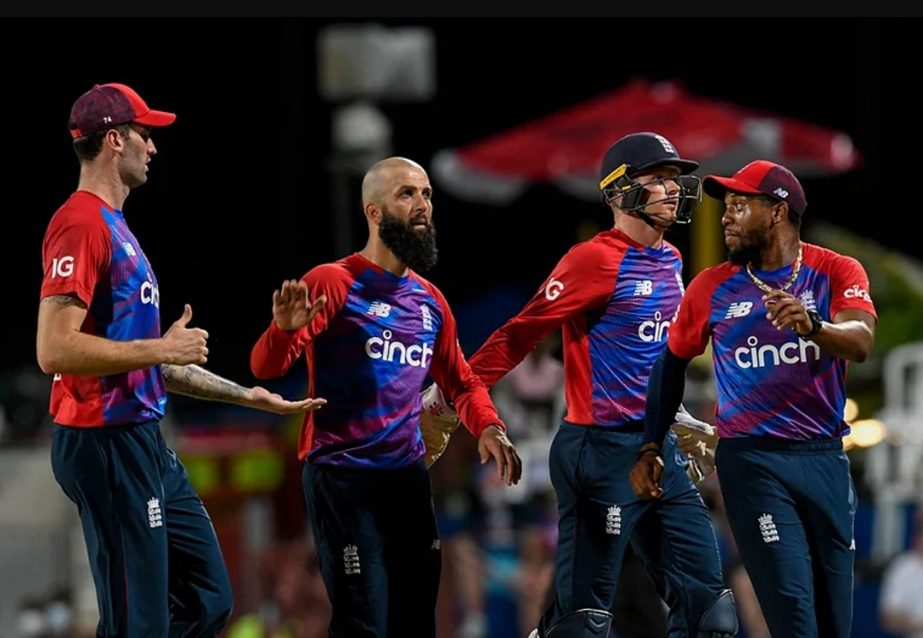 Moeen Ali (2nd from left) celebrates a wicket with his England team-mates against West Indies in the fourth Twenty20 International in Bridgetown on Sunday. AP photo