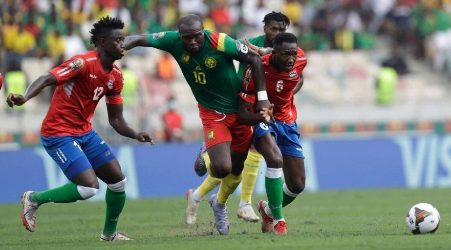Cameroon's Aboubakar Vincent (center) is challenged by Gambia's James Gomez and Sulayman Marreh (right) during the African Cup of Nations 2022 quarterfinals match between Gambia and Cameroon at Japoma Stadium, Douala, Cameroon on Saturday. AP photo