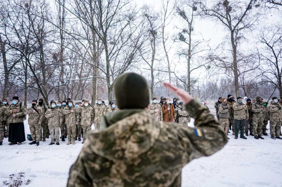 Members of Ukraine's Territorial Defence Forces line up for training in Kharkiv.