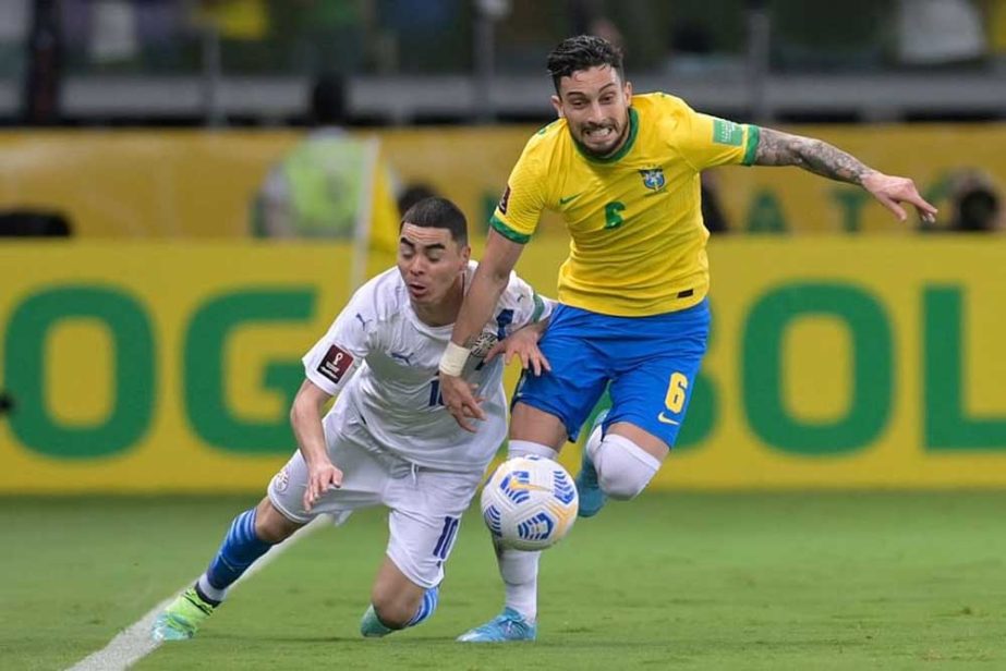 Paraguay's Miguel Almiron (left) and Brazil's Alex Telles vie for the ball during their South American qualification football match for the FIFA World Cup Qatar 2022 at the Mineirao stadium in Belo Horizonte, Brazil on Tuesday. Agency photo