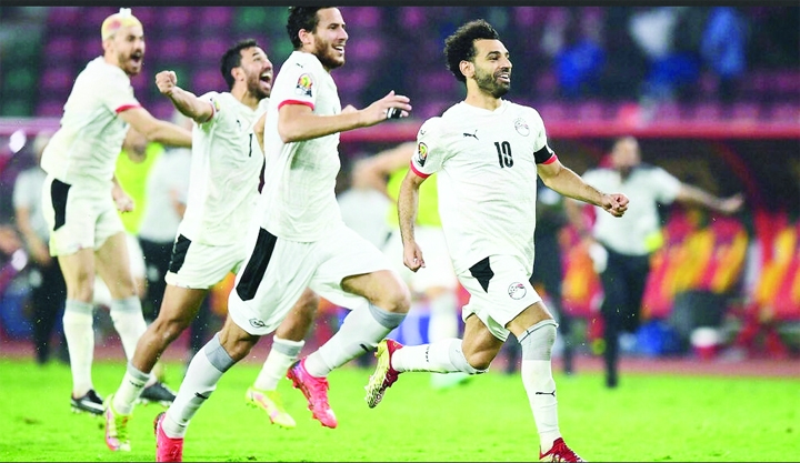 Egypt's players celebrate after winning the Africa Cup of Nations semi-final football match against Cameroon at Stade d'Olembe in Yaounde on Thursday.