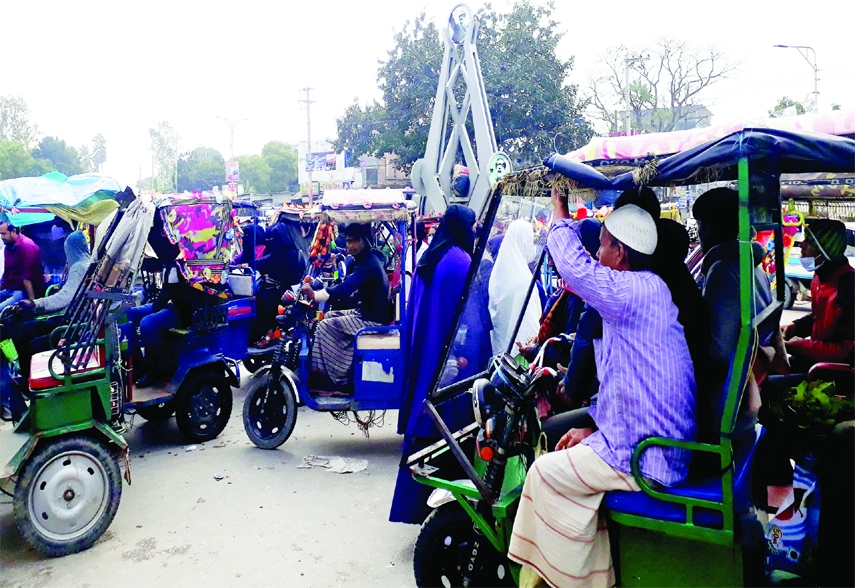 MIRZAPUR (Tangail): Battery run rickshaws have created huge traffic jam as they illegally occupied most of the places of the Old Bus Stand area in the main road of Mirzapur Pourashava. The snap was taken on Saturday.