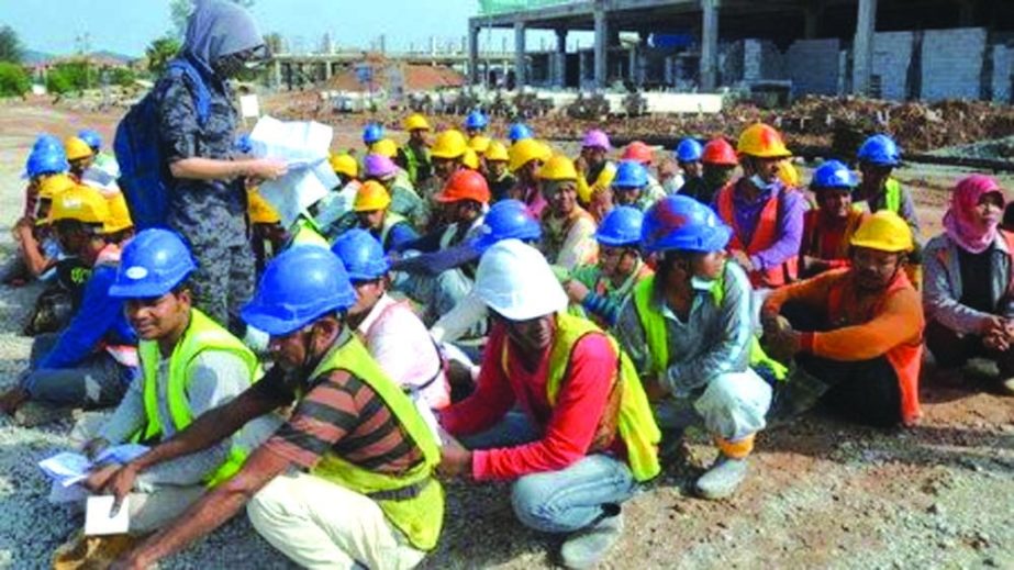 Bangladeshi workers in a camp in Malaysia