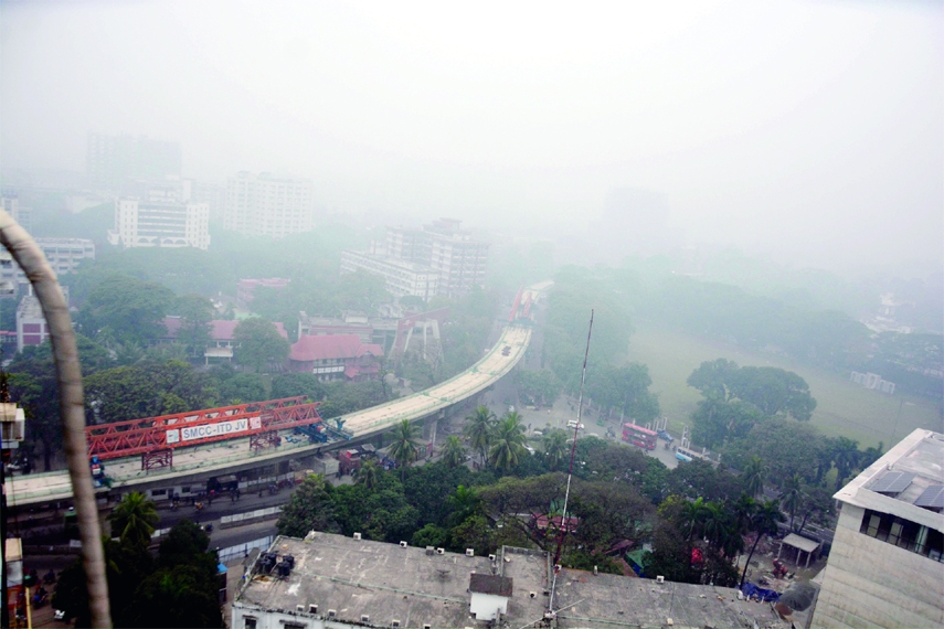 The sky remained cloudy as the day was shrouded with dense fog, so everything seemed to be hazy. This photo was taken from Motijheel area in the capital on Thursday.