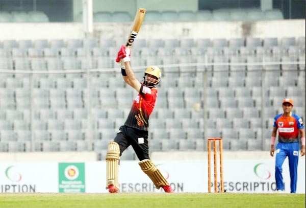 Moeen Ali (left) of Comilla Victorians plays a shot against Khulna Tigers during the match of the Bangabandhu Bangladesh Premier League Cricket at the Sher-e-Bangla National Cricket Stadium in the city's Mirpur on Friday.