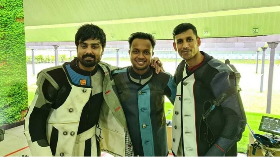 Shovon Chowdhury, Rabbi Hasan Munna and Yousuf Ali from Bangladesh pose for a photo session after clinching bronze medal in the men's 50 metre Air Rifle Team event of shooting competition at Jakarta, the capital city of Indonesia on Tuesday. Agency photo