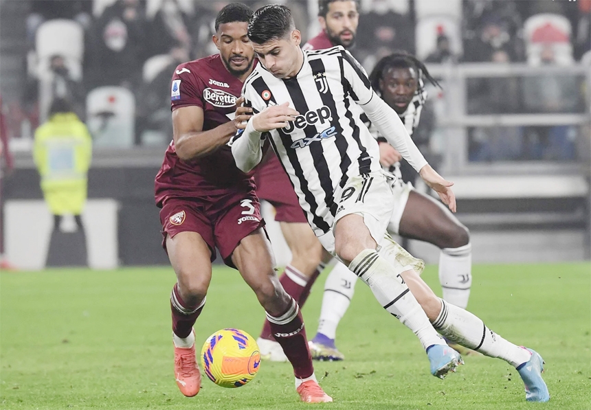 Jventus' Spanish forward Alvaro Morata (right) fights for the ball with Torino's Brazilian defender Bremer (L) during the Italian Serie A football match Juventus vs Torino at Allianz stadium in Turin on Friday.