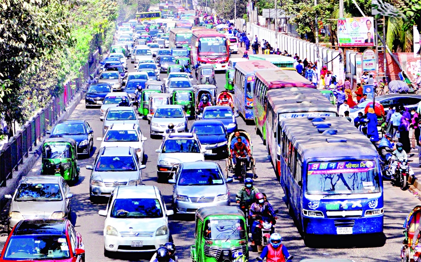 Hundreds of vehicles get clogged in a traffic congestion at a busy road of Bananai in the capital on Saturday. As a result, passengers suffered a lot.