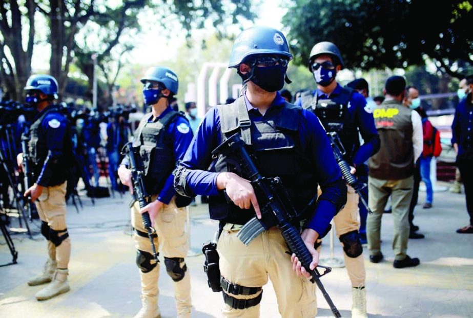 Members of Special Weapons And Tactics (SWAT) perform a security drill at the Central Shaheed Minar in the capital on Saturday, ahead of International Mother Language Day. NN photo