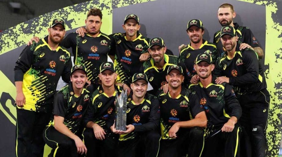 The Australian team pose with their trophy after winning their T20I cricket series against Sri Lanka in Melbourne, Australia on Sunday. AP photo