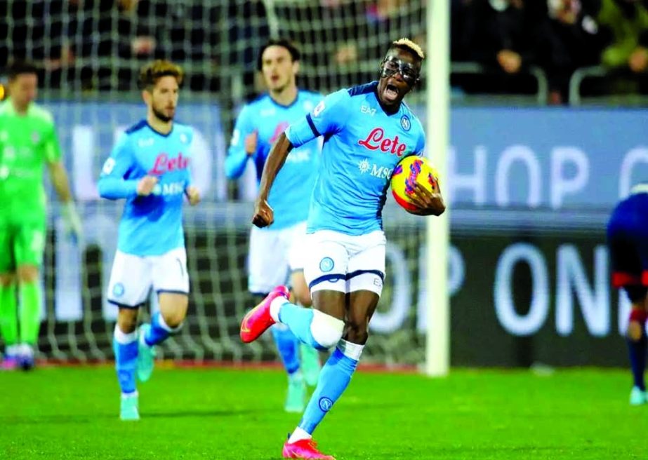 Napoli's Victor Osimhen celebrates scoring their first goal against Cagliari during the Serie A football match at Sardegna Arena, Cagliari on Monday. Agency photo