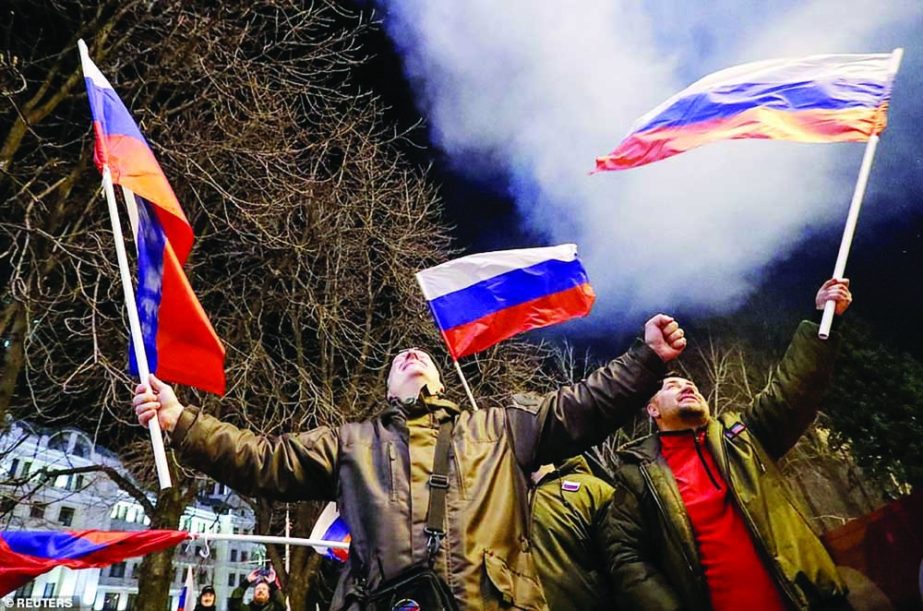 Pro-Russian separatists in Ukraine celebrated on Monday evening as fireworks went off following Russian President Vladimir Putin signing a decree recognizing two Eastern Ukrainian regions as 'independent republics'. Agency photo