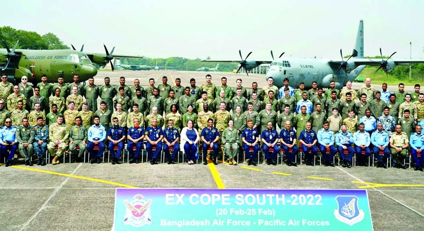 Air Officer Commanding of BAF Base Bangabandhu Air Vice Marshal Hasan Mahmood Khan poses for a photo session with the participants in joint exercise of US Air Force and Bangladesh Air Force.