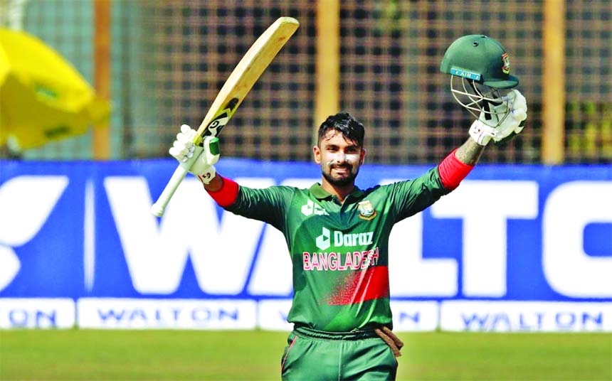 Liton Das of Bangladesh, celebrates after hitting a century against Afghanistan in the second One Day International match at Zahur Ahmed Chowdhury Stadium in Chattogram on Friday.