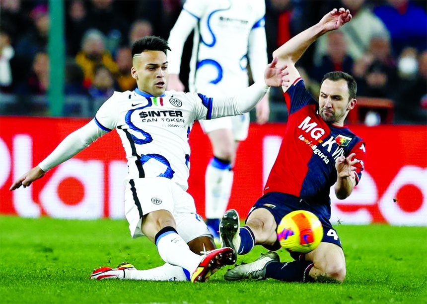 Inter Milan's Lautaro Martinez (left) vies with Genoa's Milan Badelj during a Serie A football match between Genoa and Inter Milan in Genova, Italy on Friday.