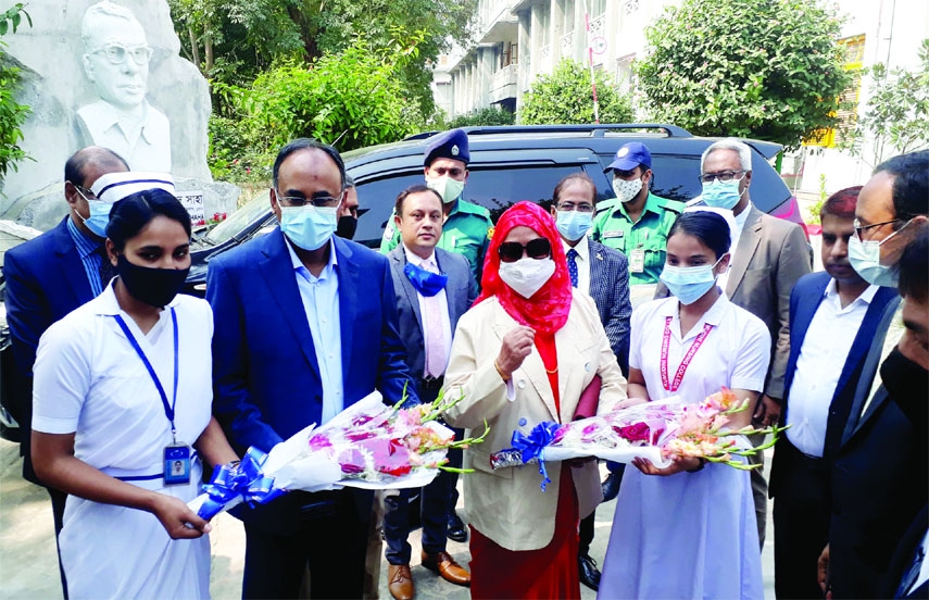 MIRZAPUR (Tangail): Students of Kumudini Nursing College in Mirzapur Upazila greet high officials of Finance Ministry during their visit on Saturday.