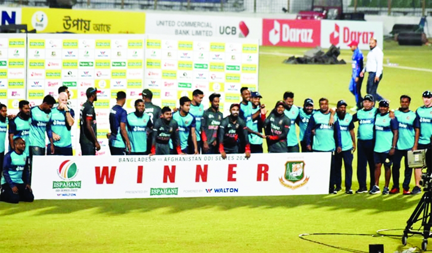 Members of Bangladesh Cricket team pose for a photo session after winning the Ispahani Limited three-match One Day International series against Afghanistan Cricket team at Zahur Ahmed Chowdhury Stadium in Chattogram on Monday.