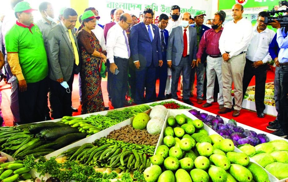 Agriculture Minister Dr Abdur Razzaque visiting the Vegetable Exhibition-2022 organised by Bangladesh Agricultural Development Corporation (BADC) held at Krishibid Institute in the capital on Monday.