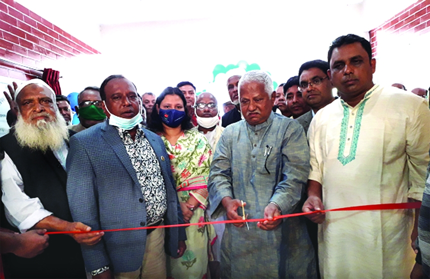 Chairman of Kurigram Zila Parishad former MP Md. Jafar Ali inaugurates a newly constructed two storied modern building of Dakbanglow at Rajarhat upazila in the Dakbanglow premises on Thursday.