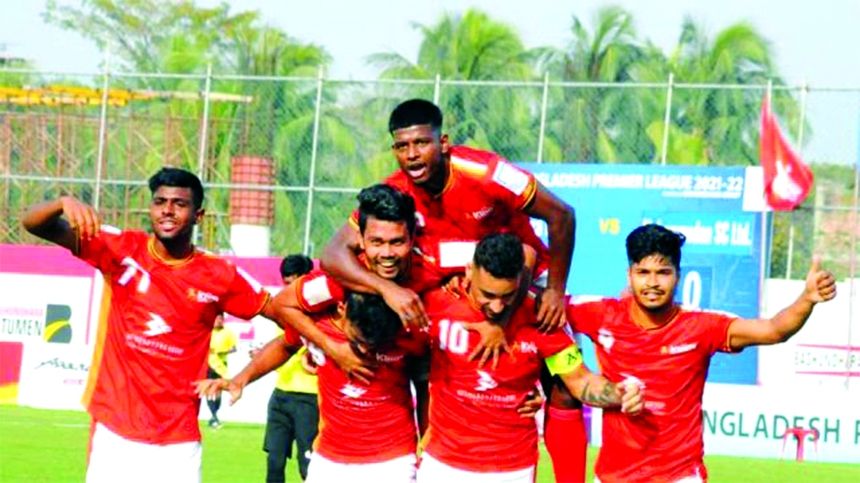 Players of Bashundhara Kings celebrate after beating Dhaka Mohammedan Sporting Club Limited in their match of the TVS Bangladesh Premier League Football at Bashundhara Sports Complex in the city on Saturday.