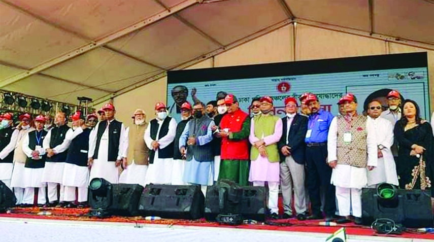 MANIKGANJ: Liberation War Affairs Minister AQM Mozammel Haque speaks as the Chief Guest at a gathering of freedom fighters at Shaheed Tapan-Miraj Stadium in Manikganj on Saturday.