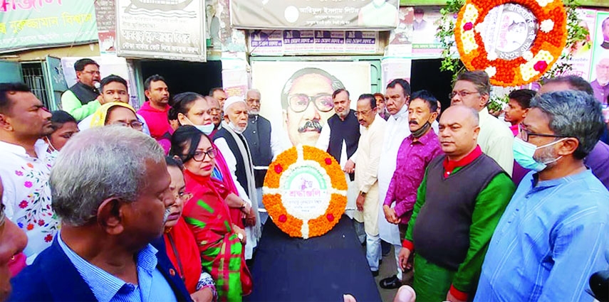 ISHWARDI (Pabna): Leaders of Upazila and Poura Awami League of Ishwardi Upazila Unit place wreath at the monument of father of the Nation Bangabnadhu Sheikh Mujibur Rahman on the occasion of the historic March 7 on Monday.