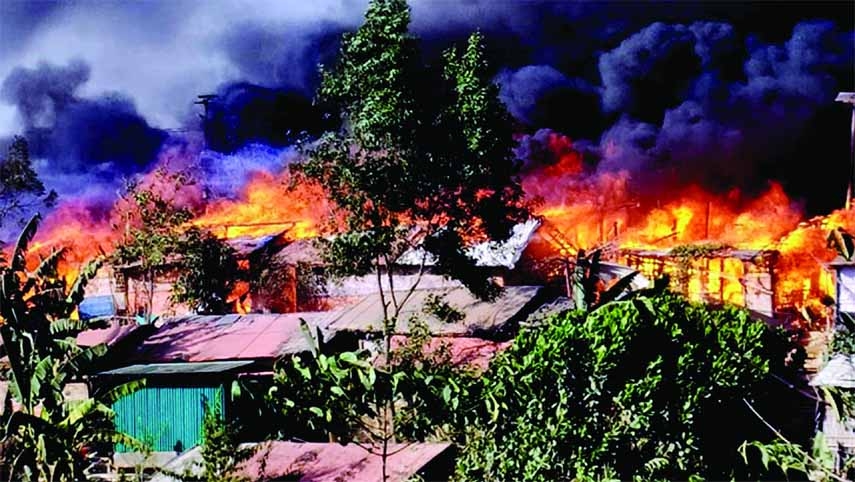 Black smoke spews from conflagration as fire broke in the Ukhiya Rohingya camp in Cox's Bazar on Tuesday that gutted more than five hundred houses and left one dead.