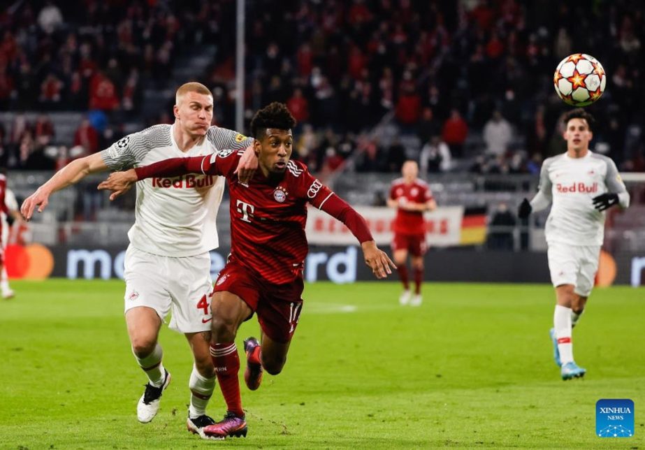 Kingsley Coman (2nd from left) of Bayern Munich vies with Rasmus Kristensen (left) of Salzburg during a UEFA Champions League round of 16 second leg match between Bayern Munich and RB Salzburg in Munich, Germany on Tuesday. Agency photo