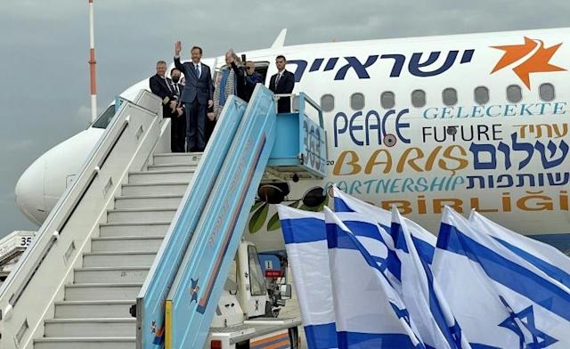 Israeli President Isaac Herzog waving hands to the officials in the airport before take off. Agency photo