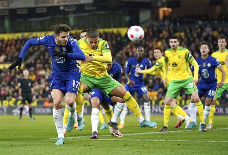 Chelsea's Saul Niguez (left) fouls Norwich City's Max Aarons during their English Premier League soccer match at Carrow Road, Norwich, England on Thursday.