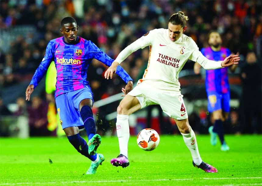 Ousmane Dembele (left) of Barcelona in action against Galatasaray in their Europa League last-16 first leg soccer match at the Camp Nou in Barcelona on Thursday.