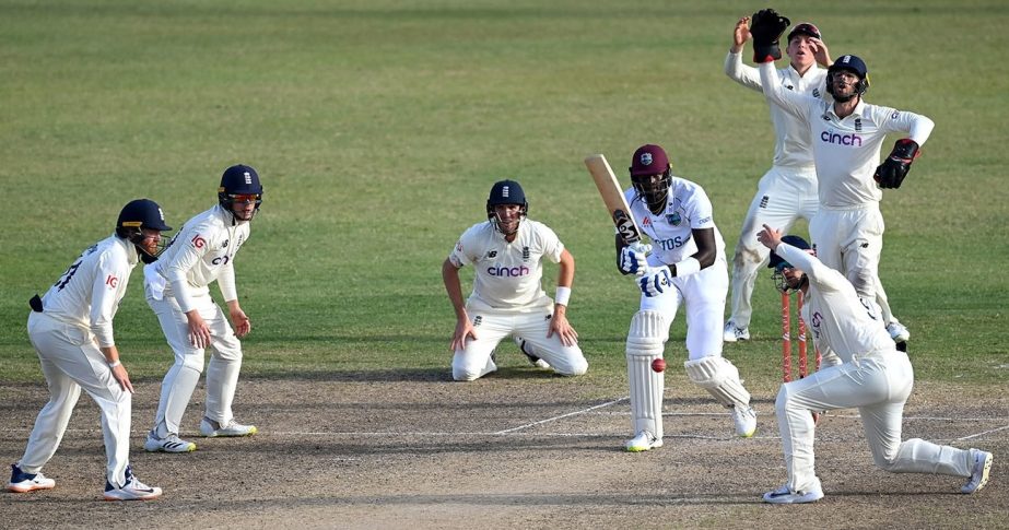 West Indies' Jason Holder defends a ball on the last day of the first Test match against England at Sir Vivian Richards Stadium in Antigua on Saturday. Agency photo