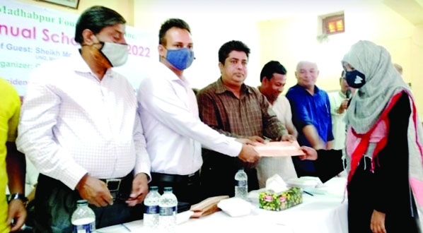 Madhabpur (Habiganj): Students receive Madhabpur Foundation USA scholarship at Madhabpur Upazila Parishad Auditorium on Wednesday.