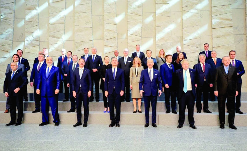 NATO member country leaders pose for a family photo before a summit to discuss Russia's invasion of Ukraine at the alliance's headquarters in Brussels, Belgium on Thursday.