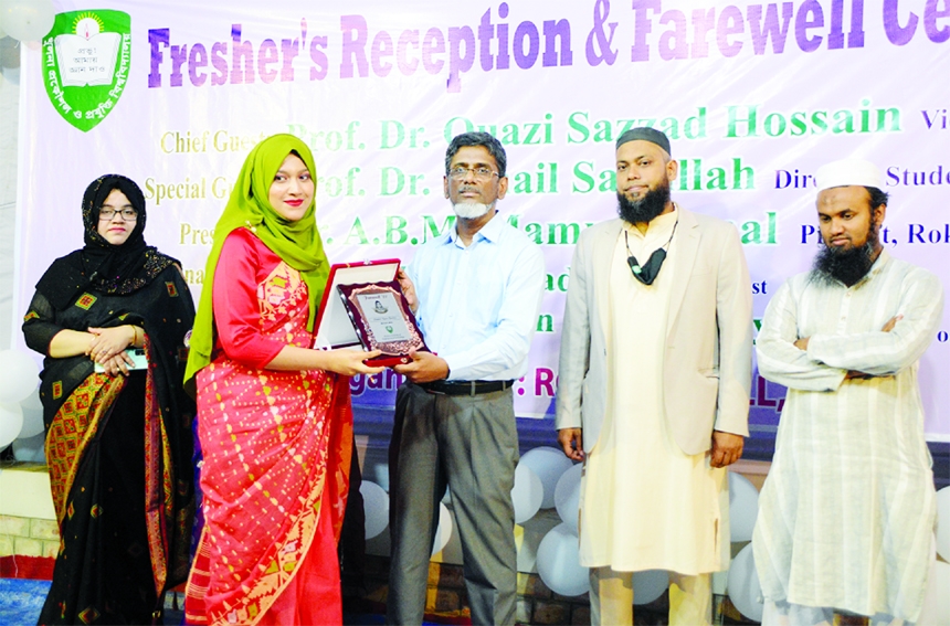 Vice Chancellor of Khulna University of Engineering & Technology distributes crests among the students in a farewell ceremony held at the university campus on Thursday.