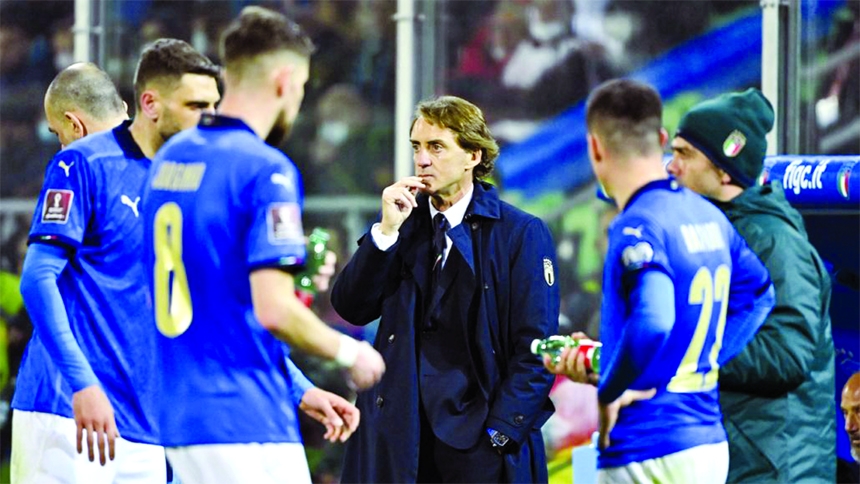 Italy's coach Roberto Mancini (centre) reacts at the end of the 2022 World Cup qualifying play-off football match between Italy and North Macedonia at the Renzo-Barbera stadium in Palermo on Thursday.