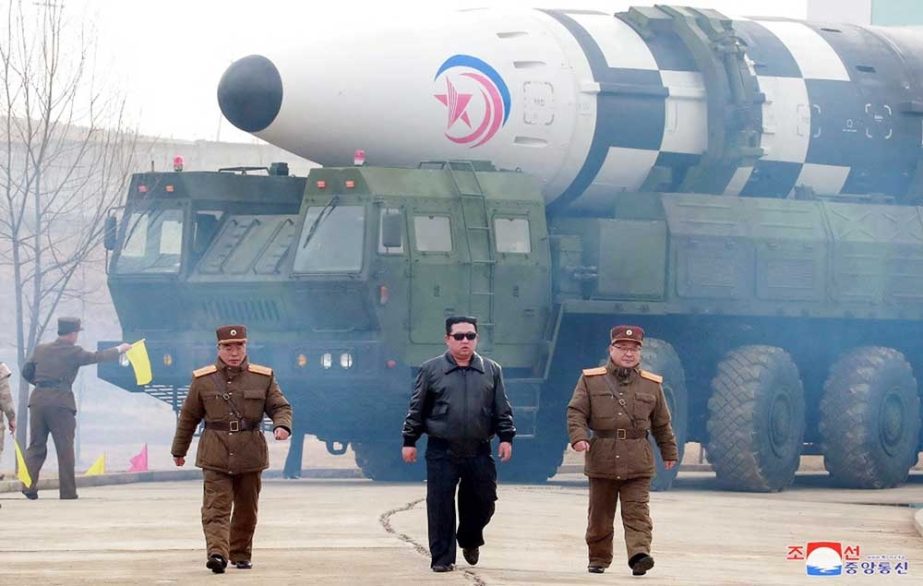 File photo: North Korean leader Kim Jong Un walks away from what state media report is a 'new type' of intercontinental ballistic missile (ICBM). Agency photo