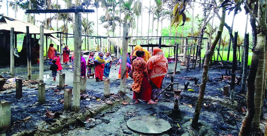 BHURUNGAMARI (Kurigram): A devastating fire guts four houses in Diadanga Village at Pathor Dubi Union of Bhurungamari Upazila recently.