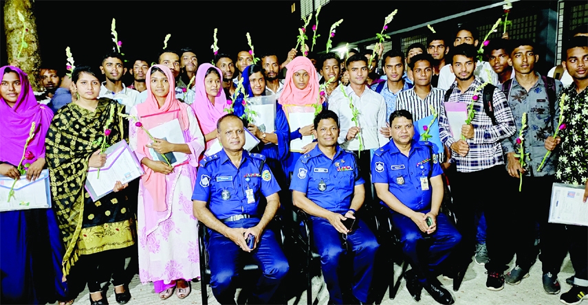 PATUAKHALI: High officials of Patuakhali District Police pose for a photo session after selecting 43 Trainee Recruite Constables (TRC) at Patuakhlai Police Line Ground on Tuesday.