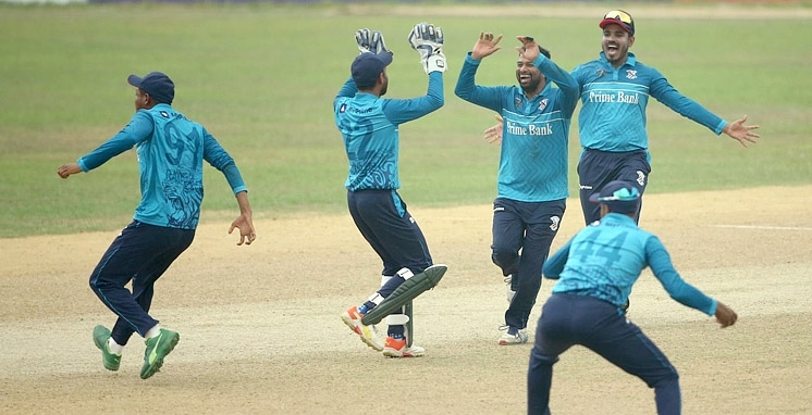 Players of Prime Bank Cricket Club celebrate dismissal of a wicket of Brothers Union during their match of the Bangabandhu Dhaka Premier Division Cricket League at BKSP Ground-4 in Savar on Wednesday. Agency photo