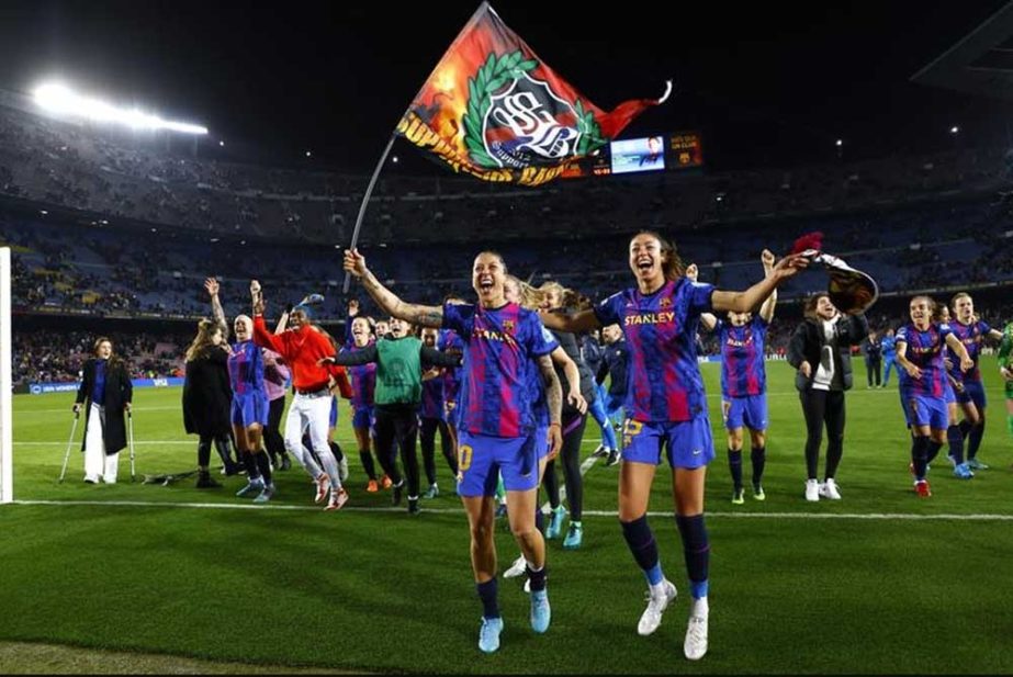 Barcelona players celebrate their win against Real Madrid during the Women's Champions League quarter final, second leg soccer match at Camp Nou stadium in Barcelona, Spain on Wednesday. Barcelona won the game 5-2. AP photo