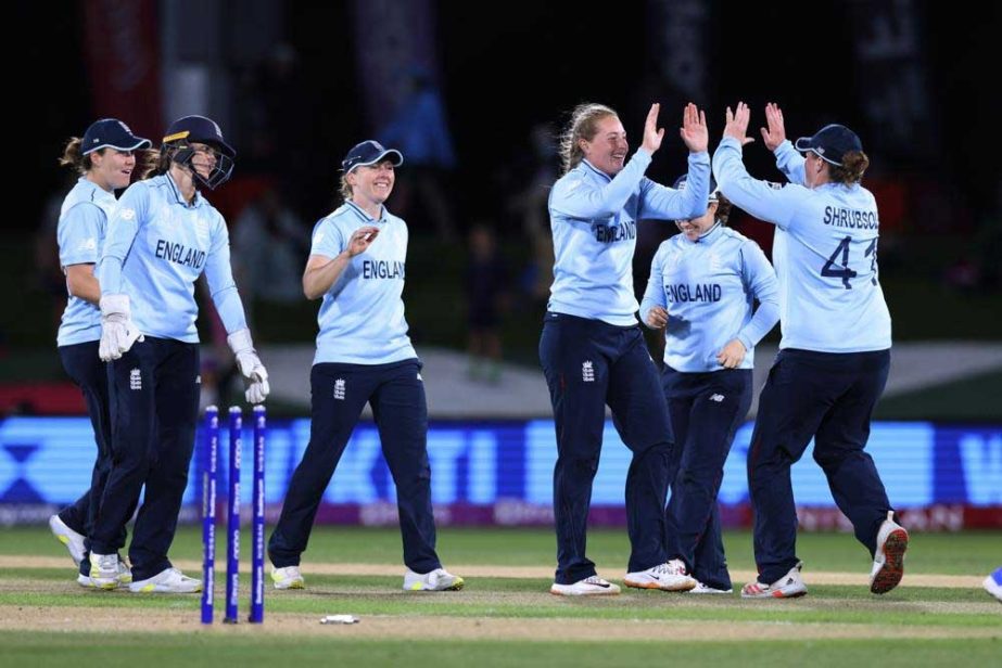 Sophie Ecclestone (third from right) celebrates with teammates after bowling South Africa's Marizanne Kapp during their semifinal of the Women's Cricket World Cup match in Christchurch, New Zealand on Thursday. AP photo
