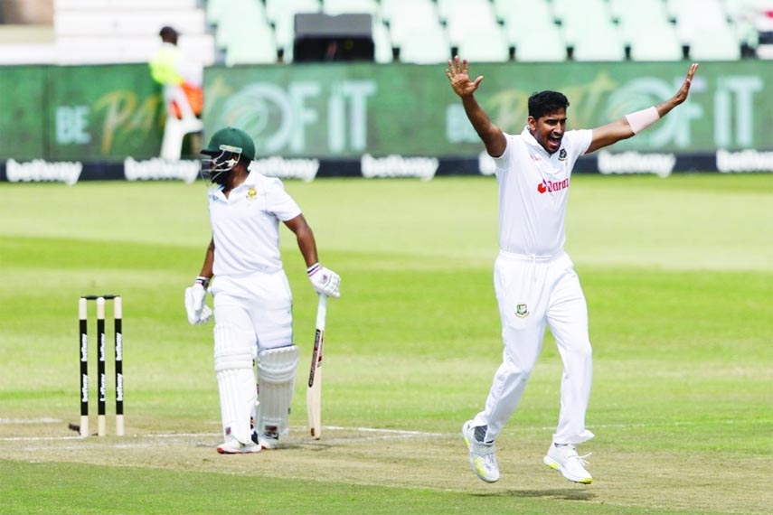 Khaled Ahmed (right) of Bangladesh appeals after striking Temba Bavuma of South Africa on the pads during the second day play of the first Cricket Test at Kingsmead in Durban of South Africa on Friday. Khaled captured four wickets at the cost of 92 runs.