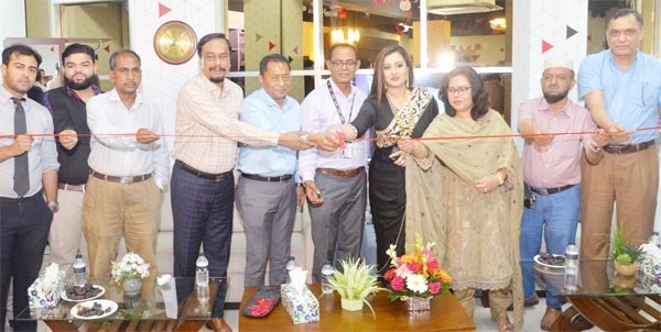 Selim H, Chairman of Bangladesh Furniture Industries Owners Association (BFIOA) and Managing Director of Hatil Furniture Ltd. inaugurates an event by cutting ribbon of ESSIL Bangladesh's showroom at Gulshan-Badda Link Road in the capital on Wednesday.
